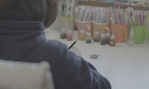 イラストレーターの正体は後日公開