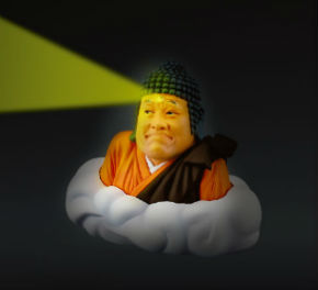 光る仏