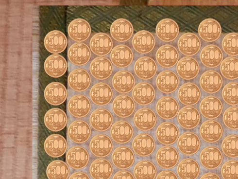 畳に500円玉を敷き詰めた画像のアップ
