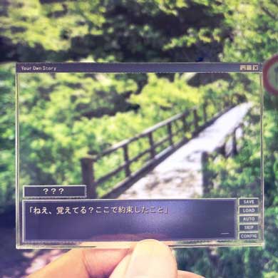 主人公レンズ ギャルゲー キーホルダー ヴィレッジヴァンガード 発売