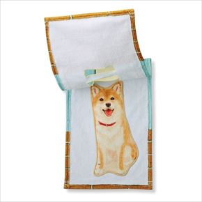 すき間からのぞく柴犬タオル