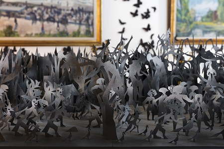 紙でできた黒蝶の群れ