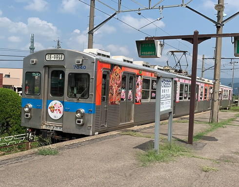 弘南鉄道桜ミクラッピング電車