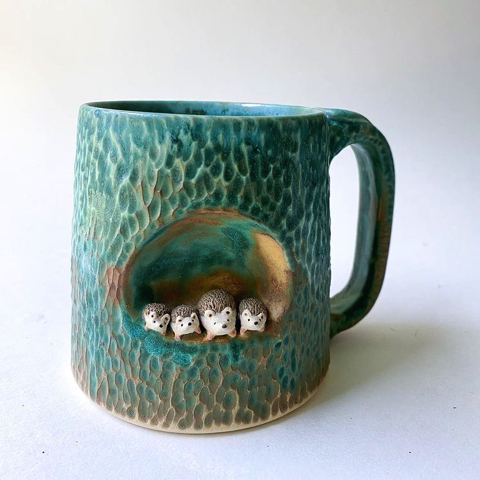 マグカップに籠る動物