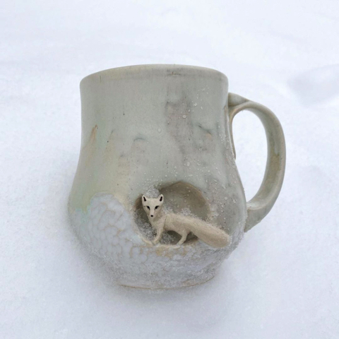 マグカップに籠る動物