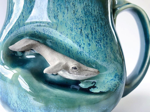 マグカップに籠る動物