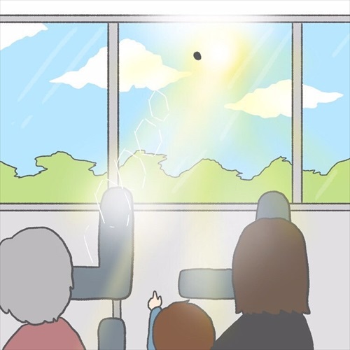 カナブンを指さす赤ちゃん