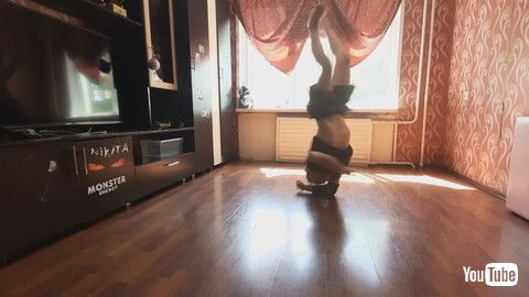 「Kid Performs Multiple Spins On Elbow - 1203607」