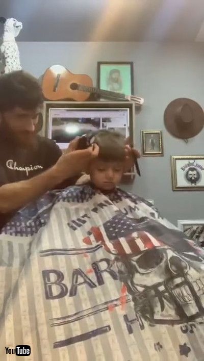 「Little Boy Falls Asleep While Getting His Hair Cut By Barber - 1200925」