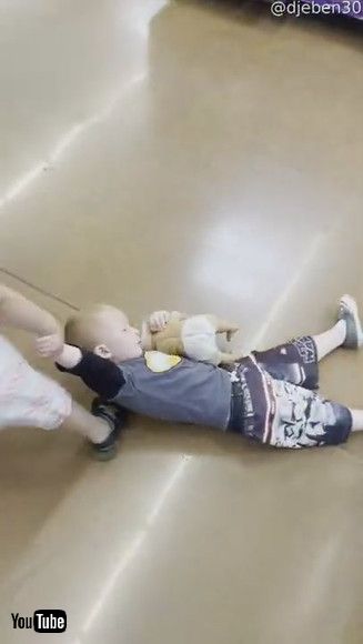 「Sister Drags Cranky Brother Through Store || ViralHog」