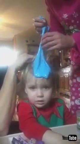 「Parents Try to Remove Blue Slime Stuck in Kid's Hair - 1212521」
