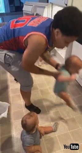 「Parent Struggles to Keep Triplets Out of Open Refrigerator as They Keep Crawling Into it - 1238905」