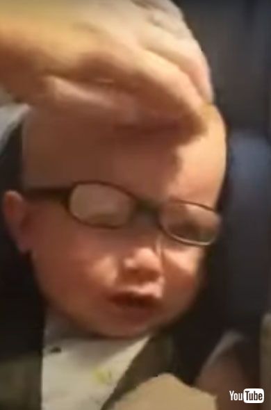 9-Month-Old Smiling with New Clear