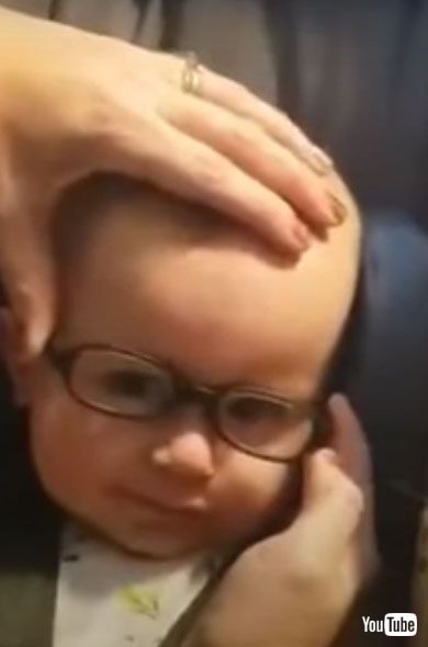 9-Month-Old Smiling with New Clear