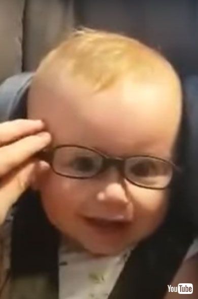 9-Month-Old Smiling with New Clear