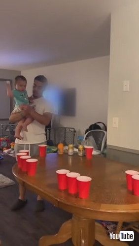 「Toddler Participates in Beer Pong Game and Cheers Over Hitting Mark - 1261265」