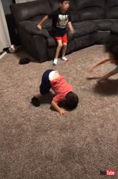 Kid Bangs His Head on the Floor While Imitating his Sister Trying to Frontflip - 1218689