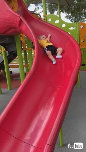 「Baby Slips Slowly Down Slide || ViralHog」