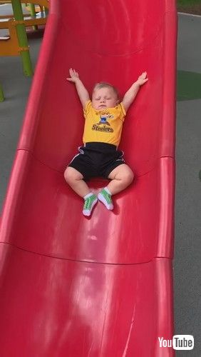 「Baby Slips Slowly Down Slide || ViralHog」