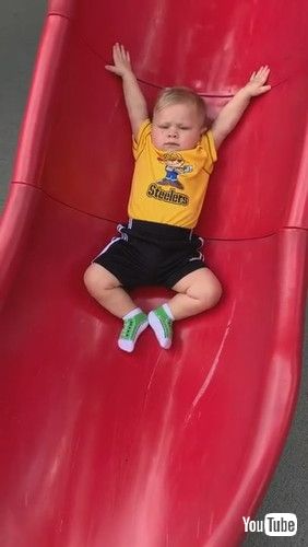「Baby Slips Slowly Down Slide || ViralHog」