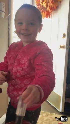 「Little Kid Draws On Mother's Car With Screwdriver While Father Works Nearby - 1269650」