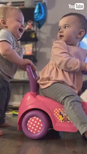 「Baby Boy Belly Laughs While Pushing Twin Sister || ViralHog」
