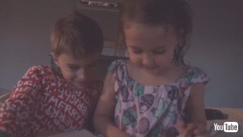 「Kid Helps Toddler Sister to Read Bedtime Story - 1256668」