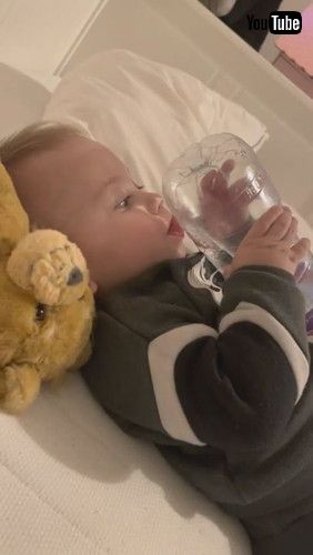「Baby Tries Drinking Water From Bottom Of Bottle - 1279880」