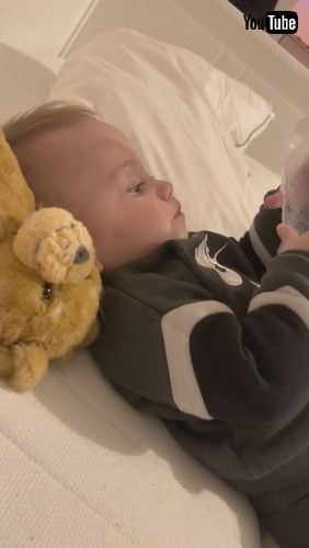 「Baby Tries Drinking Water From Bottom Of Bottle - 1279880」