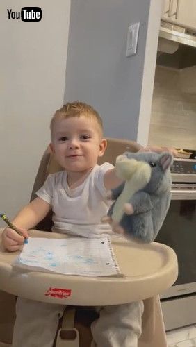 「Toddler Gets Scared While Playing With Talking Stuffed Hamster - 1287886」