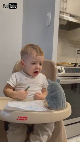 「Toddler Gets Scared While Playing With Talking Stuffed Hamster - 1287886」