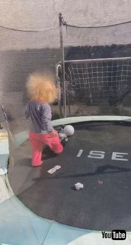 「Little Girl with Wild Hair Plays on Trampoline || ViralHog」
