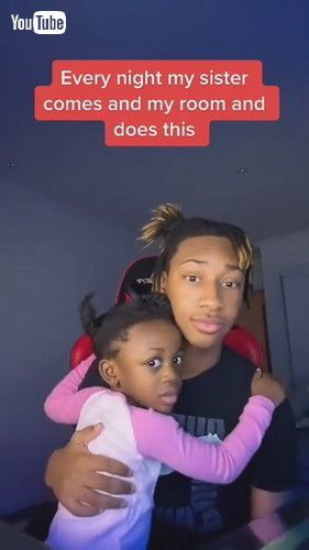 「Little Sister Hugs Guy And Kisses Him Goodnight Before Bed - 1306674」