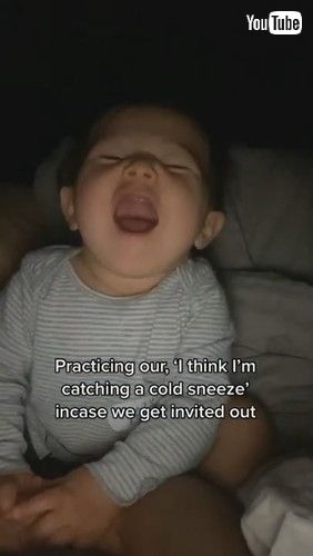 「Baby Fake Sneezes While Imitating Parent - 1296859」