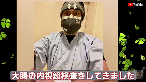 検査衣姿の桑野信義