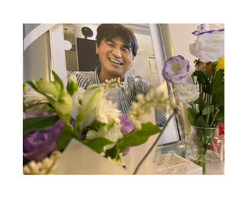 大島康徳さんの遺影