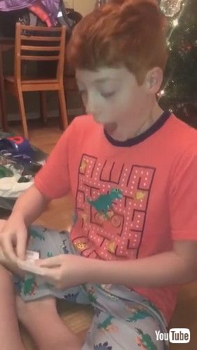 「Kid Reacts To Family Surprising Him With His Favorite Singer's Concert Tickets For Christmas-1331400」