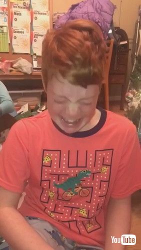 「Kid Reacts To Family Surprising Him With His Favorite Singer's Concert Tickets For Christmas-1331400」