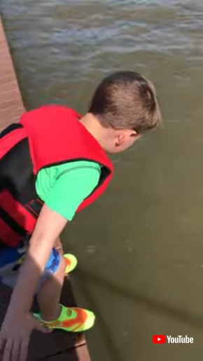 Kid Tries to Hype Himself Up to Jump off Dock || ViralHog