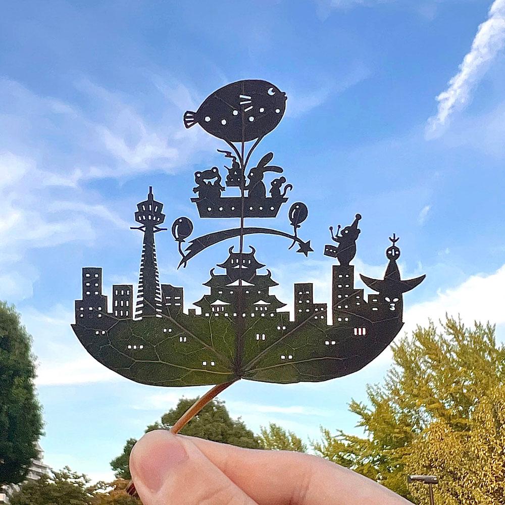 「大阪のもの、いくつ見つけられる？」　葉っぱの切り絵で大阪を表現した作品が「すごく素敵」「なんて綺麗な作品」と話題
