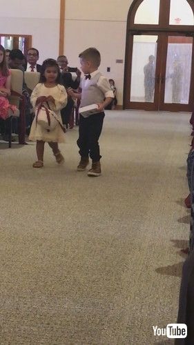 「Flower Girl Forgets That She Is Supposed to Throw Flowers at Wedding - 1361357」