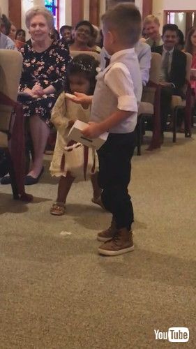 「Flower Girl Forgets That She Is Supposed to Throw Flowers at Wedding - 1361357」