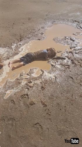 「Child Falls Asleep in Mud Puddle || ViralHog」