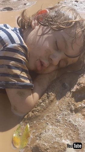 「Child Falls Asleep in Mud Puddle || ViralHog」