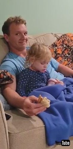 「Dad's Hilarious Reaction to Toddler Dozing Off in His Arms - 1380264」