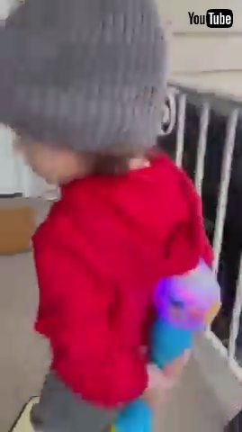 「Little Kid Tries to Sneak in Toy Behind His Back by Lying to His Mother - 1385173」