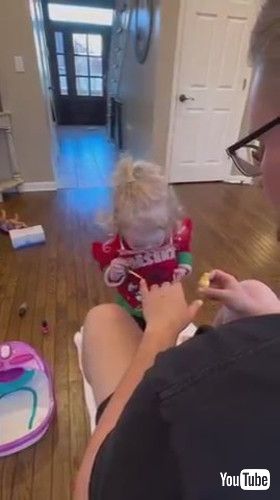 「Adorable Little Girl Applies Nail Polish to Her Father - 1395439-2」