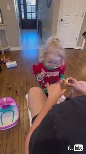 「Adorable Little Girl Applies Nail Polish to Her Father - 1395439-2」