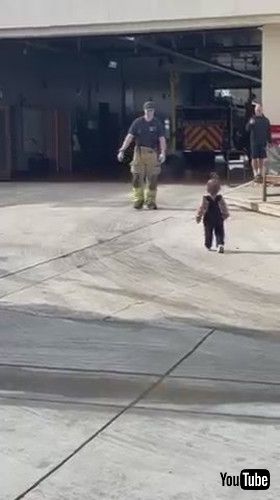 「Toddler Walks Past Fire Fighter Dad While Paying Him Surprise Visit at Fire Station - 1395798」