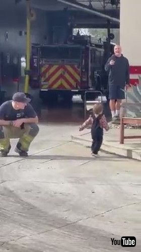 「Toddler Walks Past Fire Fighter Dad While Paying Him Surprise Visit at Fire Station - 1395798」